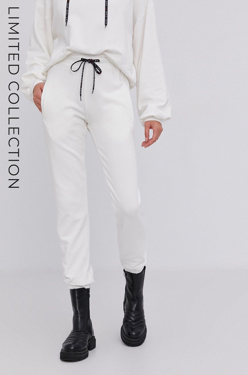 Answear Lab Spodnie ECO damskie kolor kremowy proste medium waist