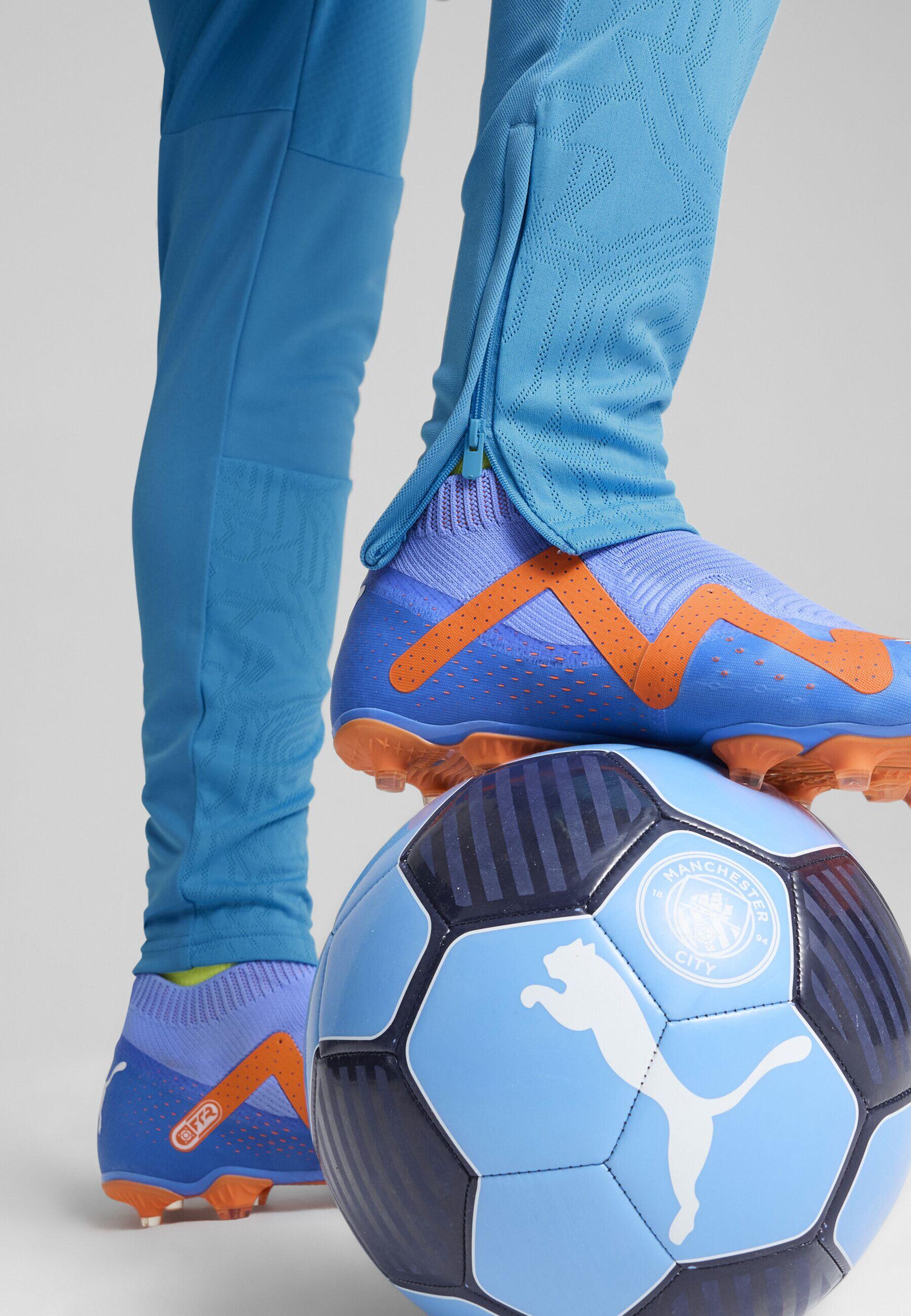 Męskie spodnie treningowe Manchester City PUMA Magic Blue Yellow Glow