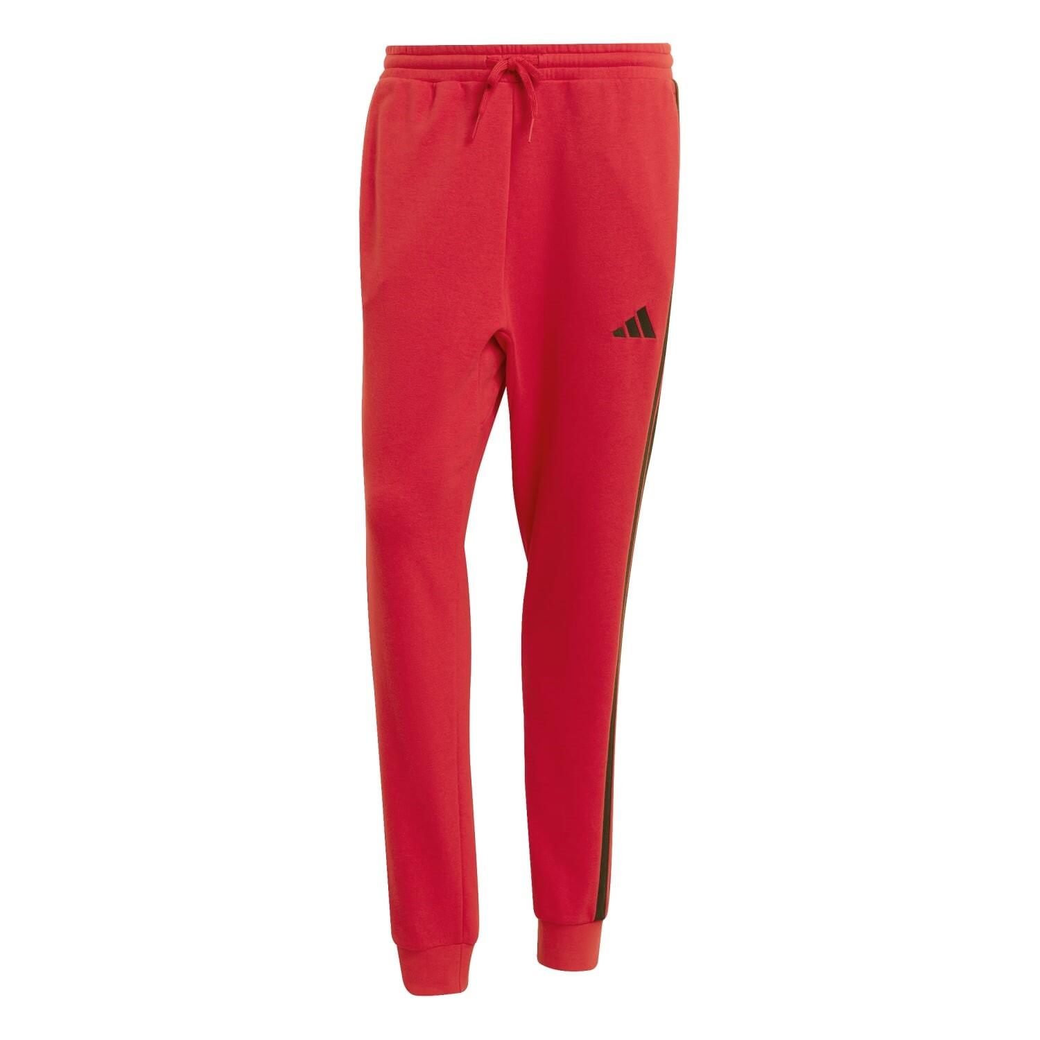 Spodnie Mężczyzna Adidas Essential 3 Stripes czerwony