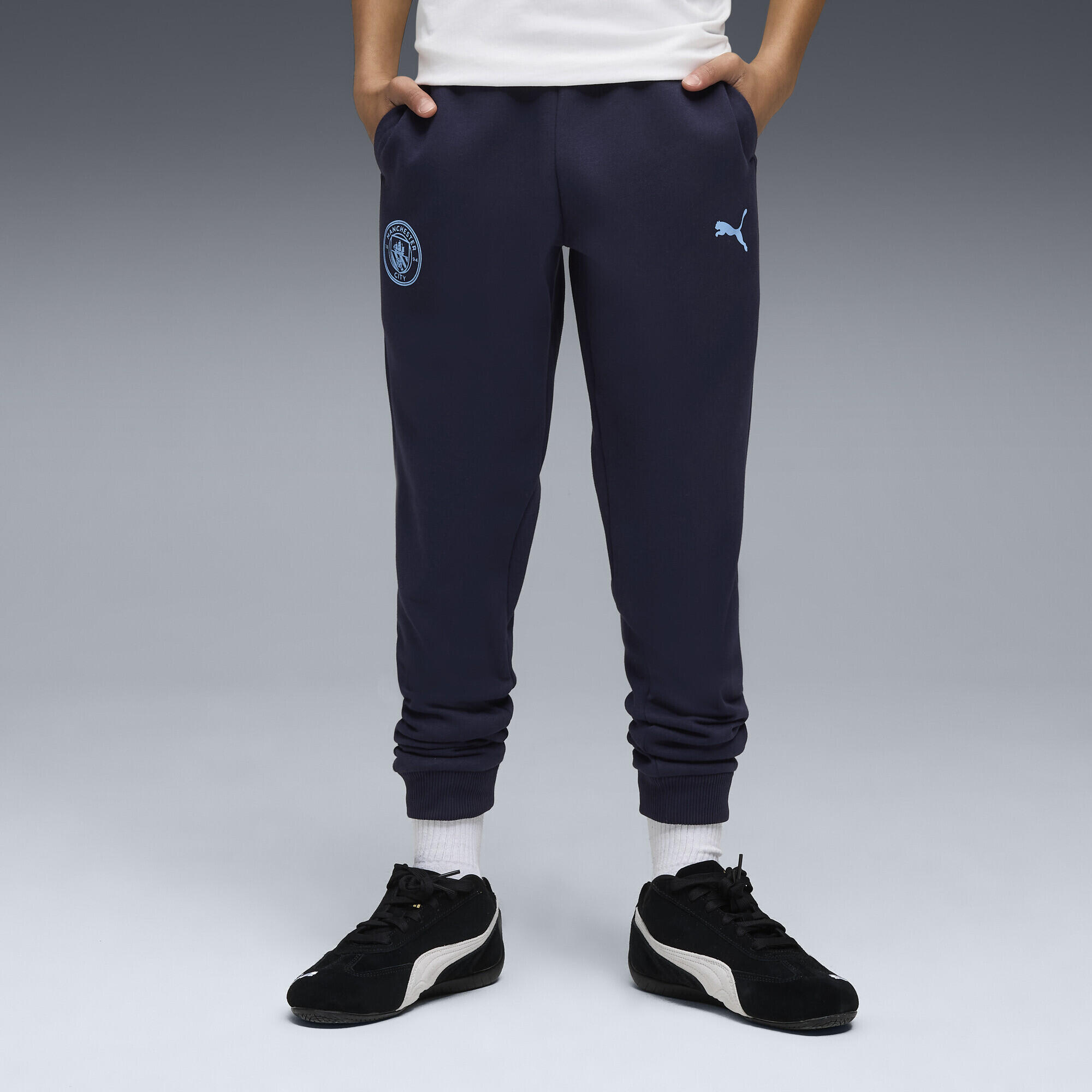 Młodzieżowe spodnie Manchester City FtblEssentials PUMA