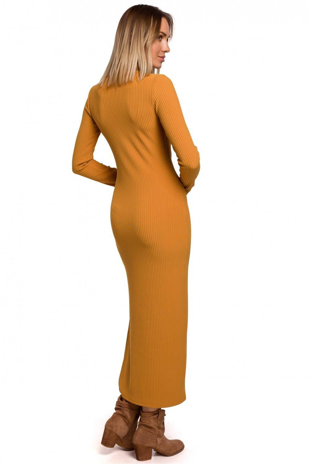 Opis: Sukienka dzianinowa długa dopasowana z rozcięciem żółta.
