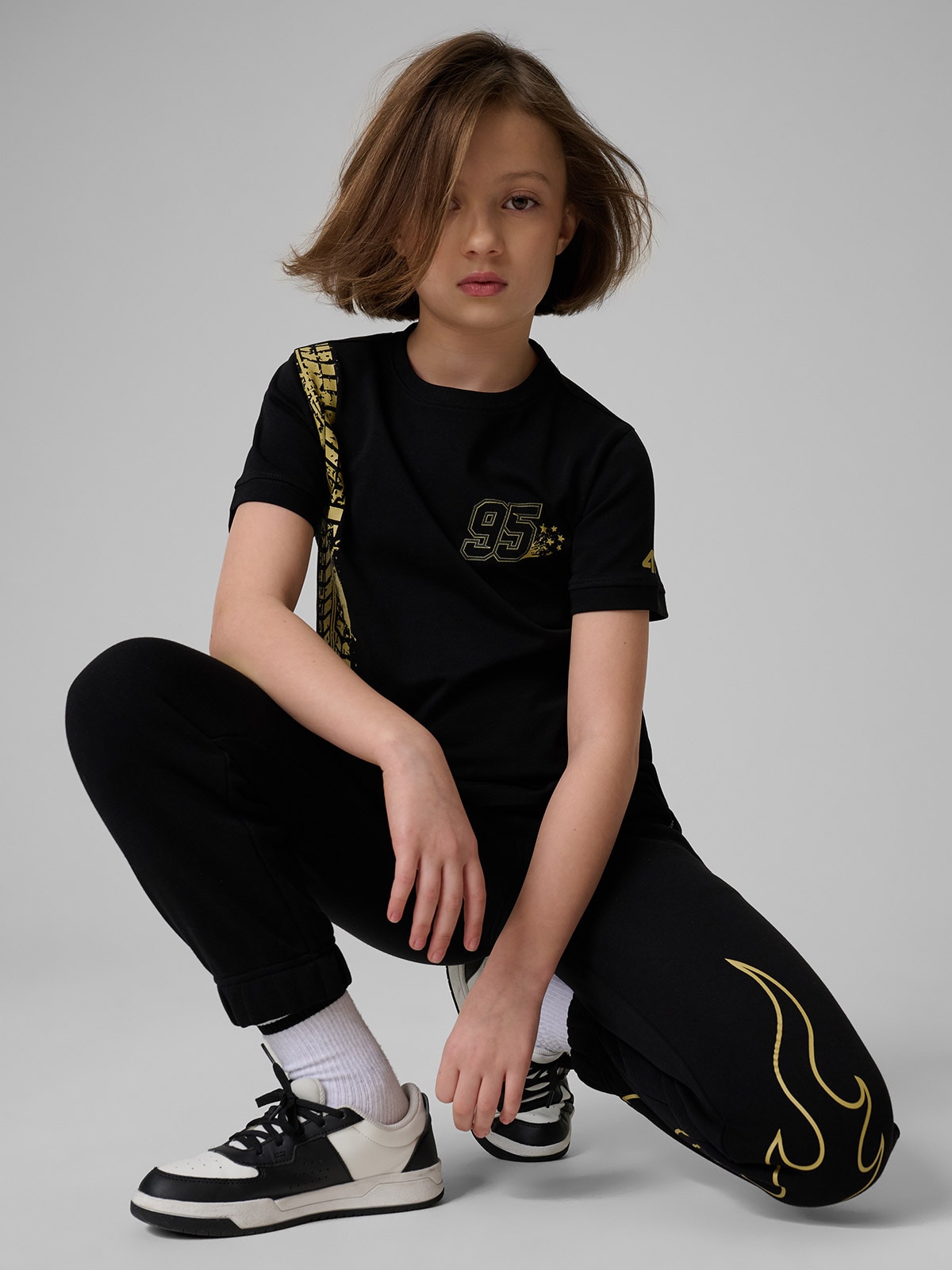 4F T-shirt regular z nadrukiem dziecięcy 4F x Bartosz Zmarzlik - czarny 134/140 (8-10 lat)