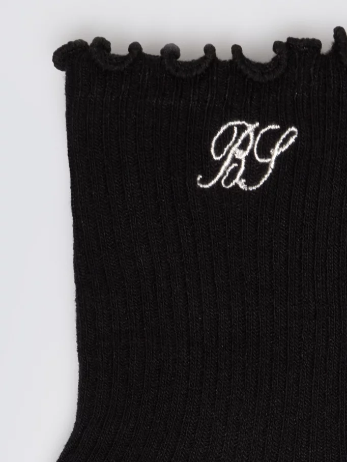 Skarpety dziewczęce prążkowane z falbanka czarne Olivia 906