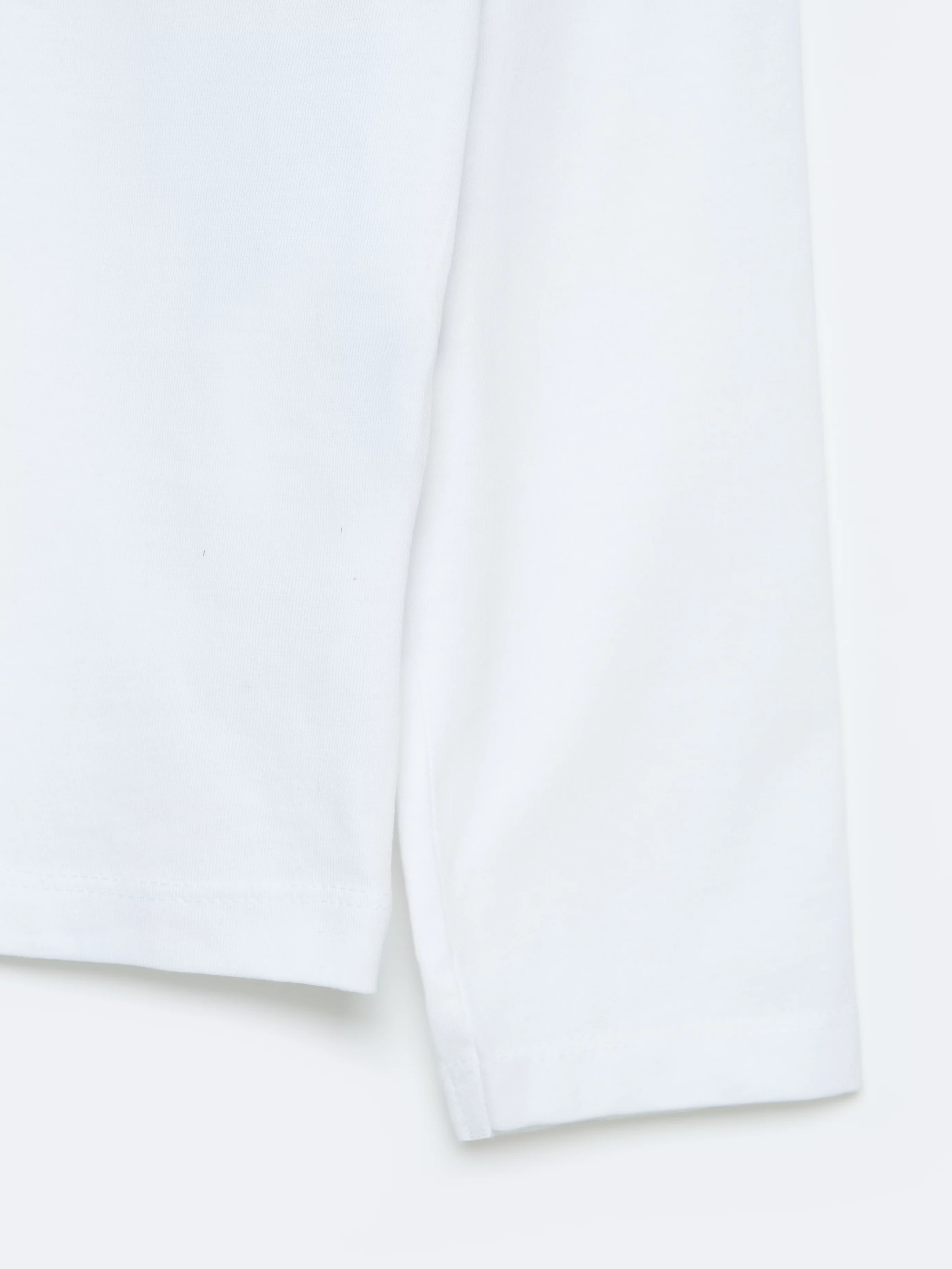 Bluzka dziewczęca longsleeve z kolorowym nadrukiem biała Alicja 101