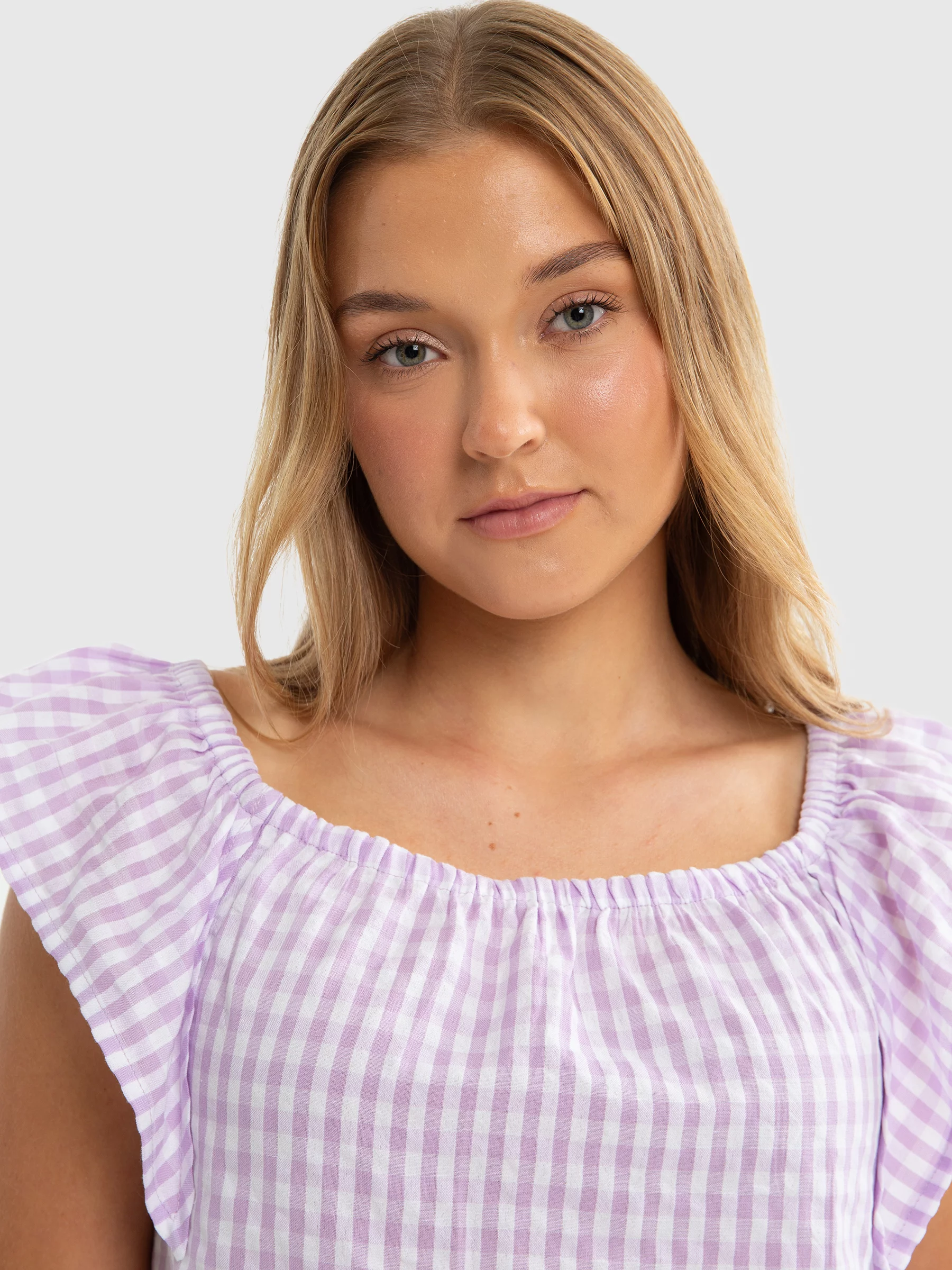 Bluzka dziewczęca ze strukturalnej tkaniny w kratkę fioletowa Kinga 500