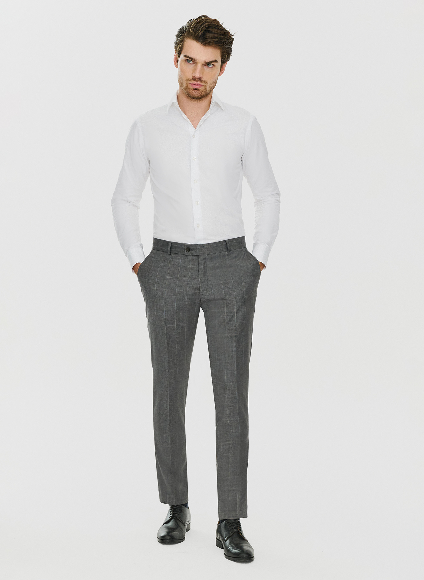 Ciemnaszare spodnie garniturowe w drobną kratę - Pako Lorente
