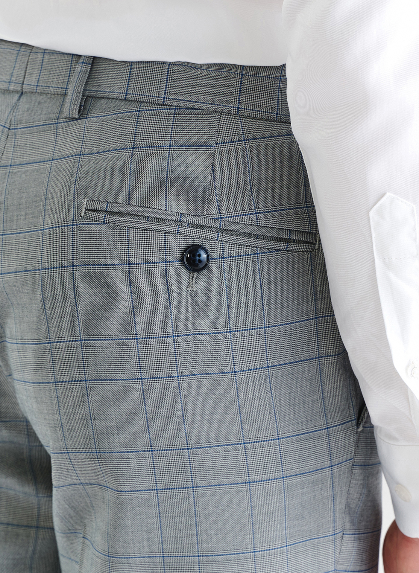 Szare spodnie garniturowe w niebieską kratę - Pako Lorente