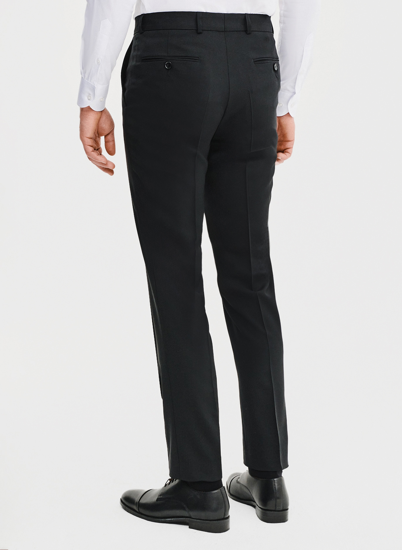 Wełniane spodnie garniturowe w kolorze czarnym - Pako Lorente