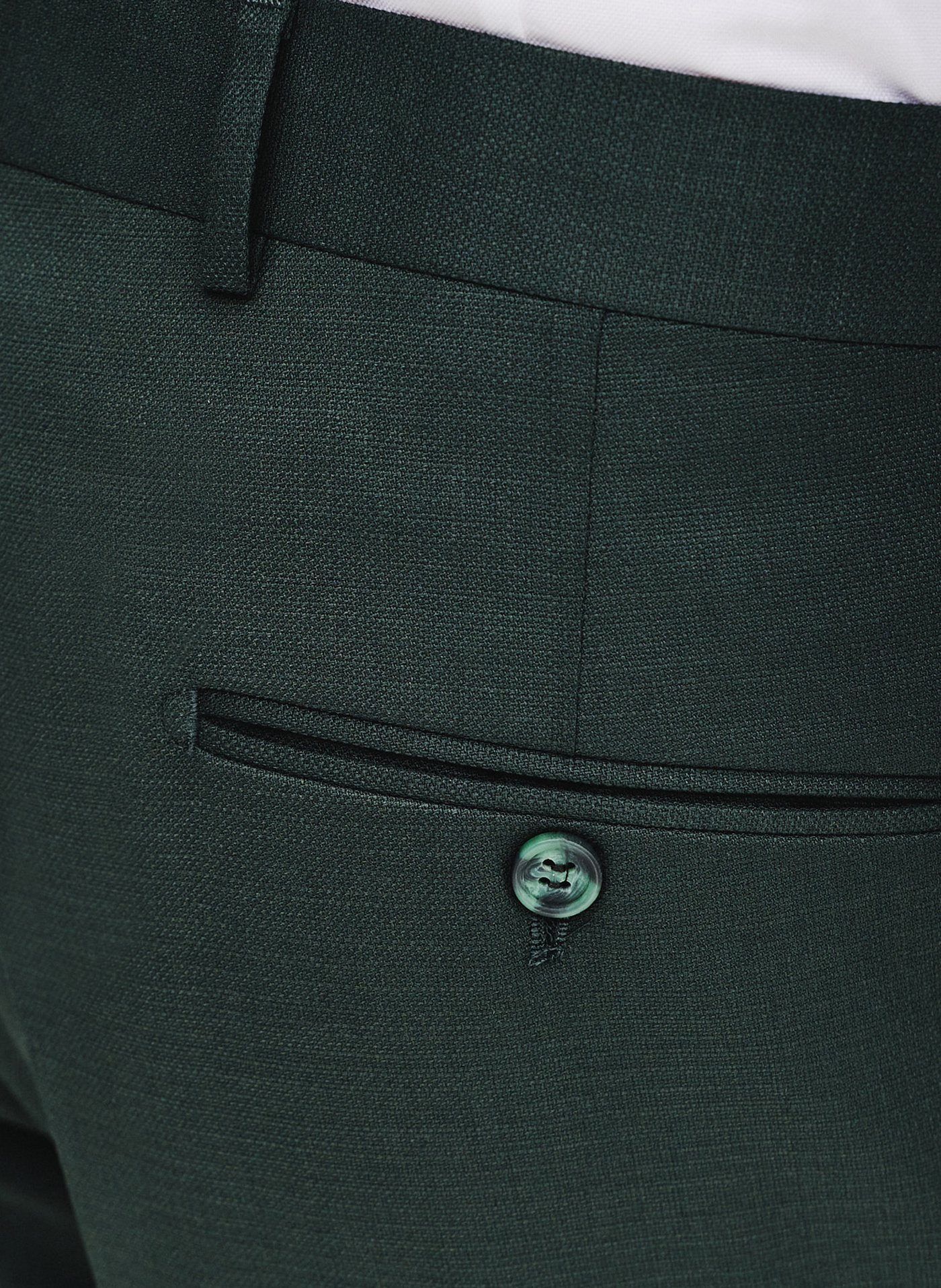 Gładkie spodnie garniturowe w kolorze zielonym - Pako Lorente