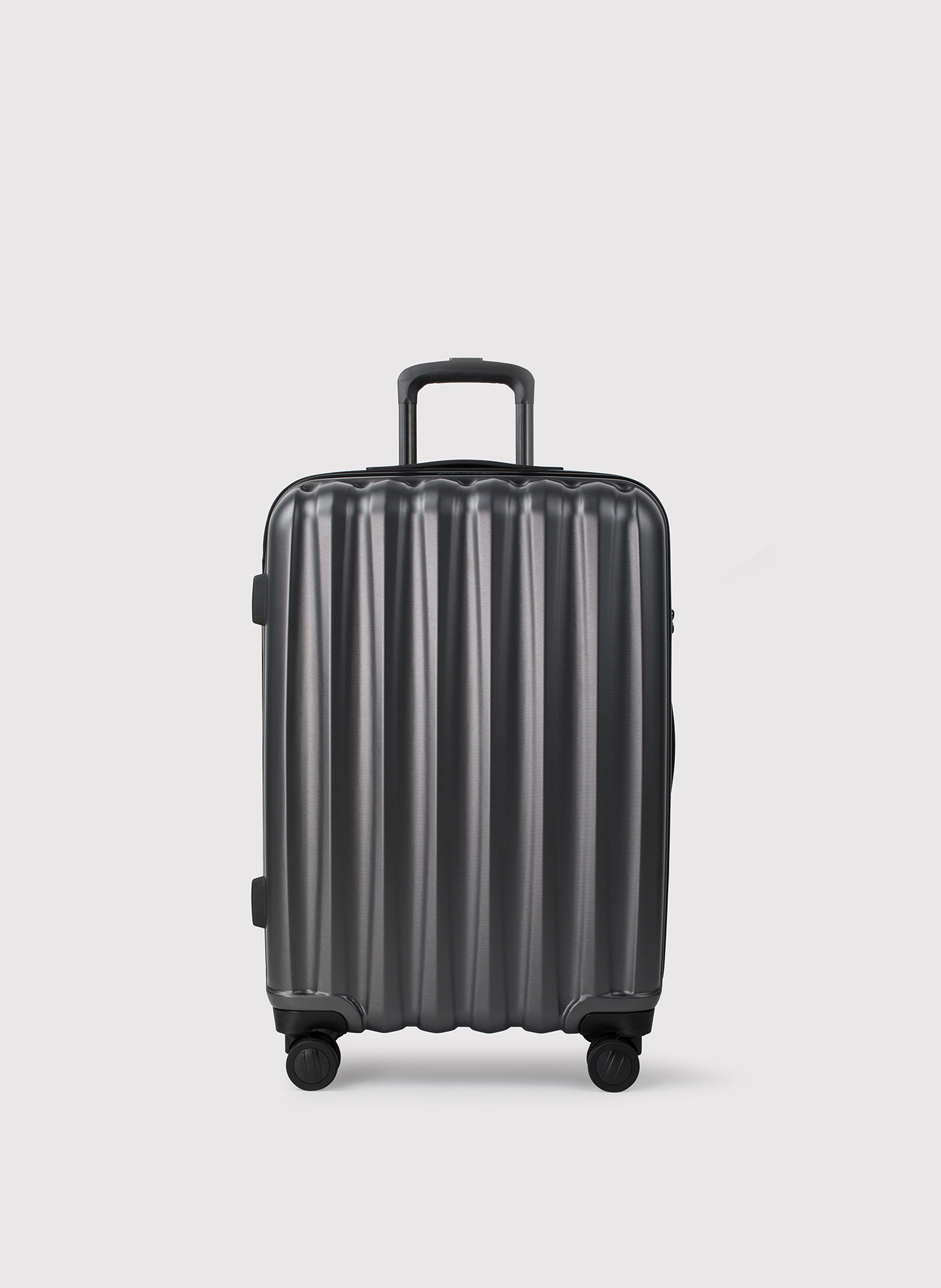 Średnia ciemnoszara walizka ze żłobieniami - Pako Lorente