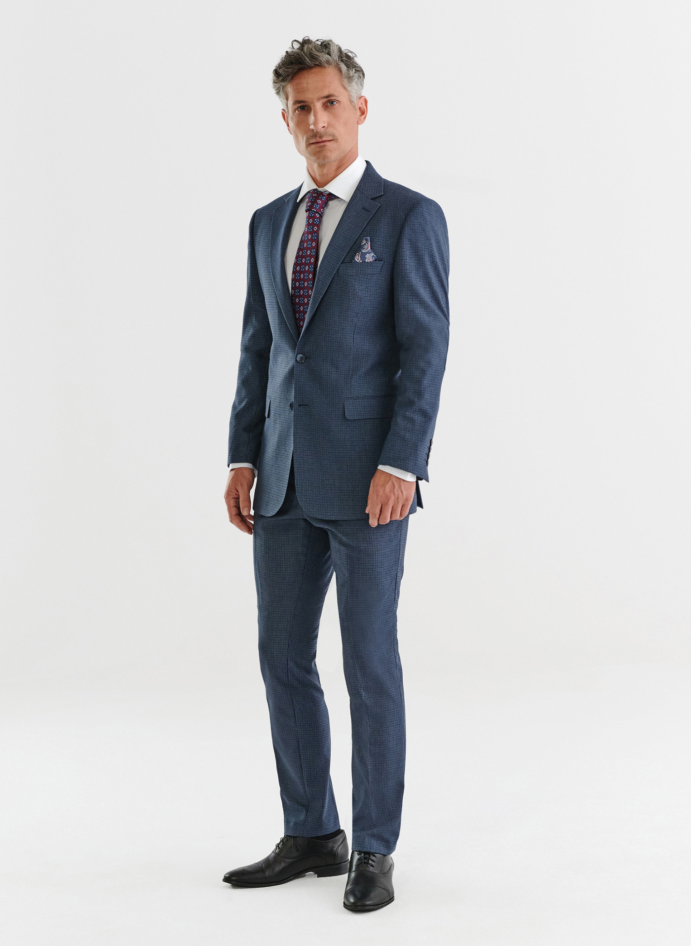 Granatowe spodnie garniturowe w pepitkę - Pako Lorente