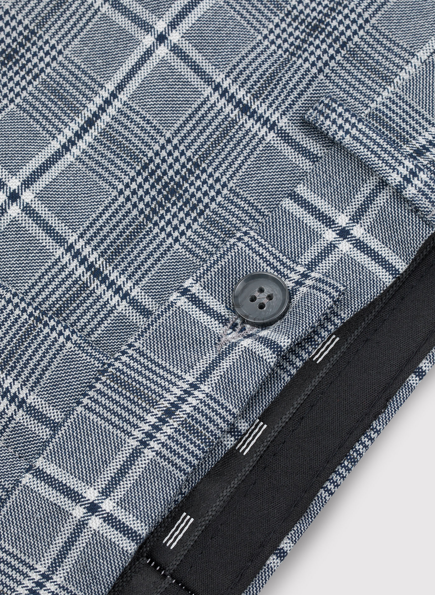 Szare spodnie garniturowe w granatową kratę - Pako Lorente