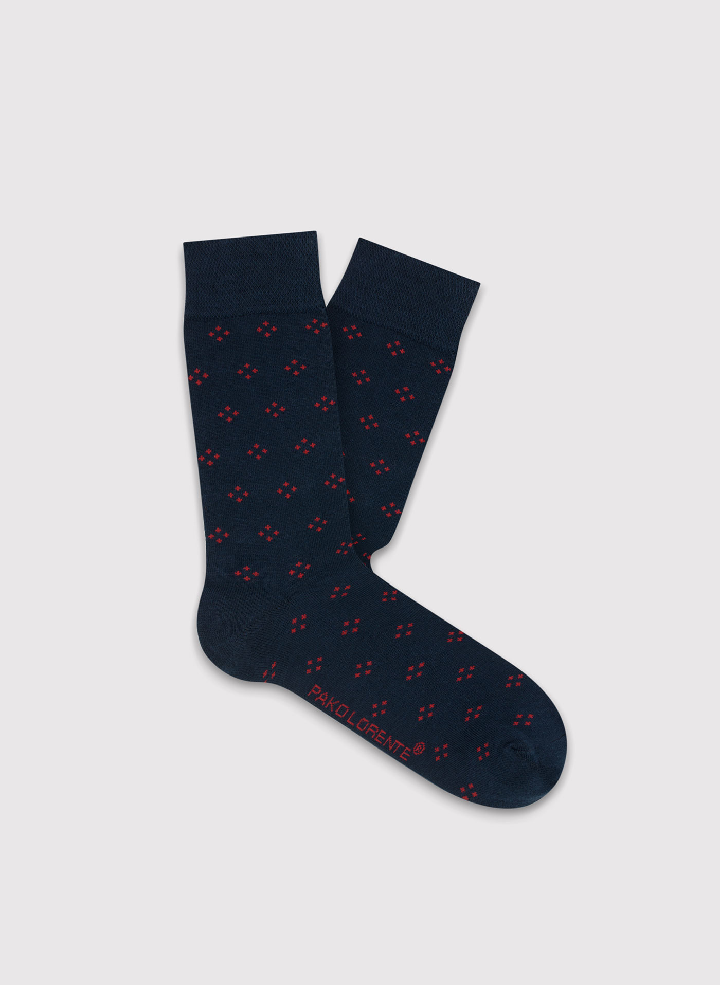 Granatowe skarpetki męskie w czerwone wzorki P000B-SX-525-G-0 - Pako Lorente