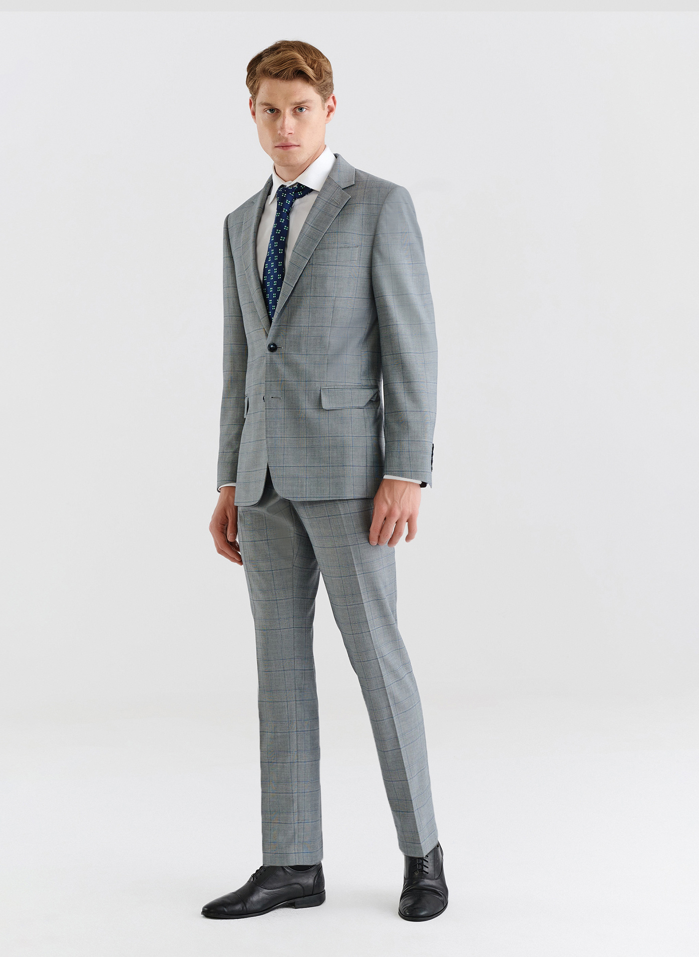 Szare spodnie garniturowe w niebieską kratę - Pako Lorente