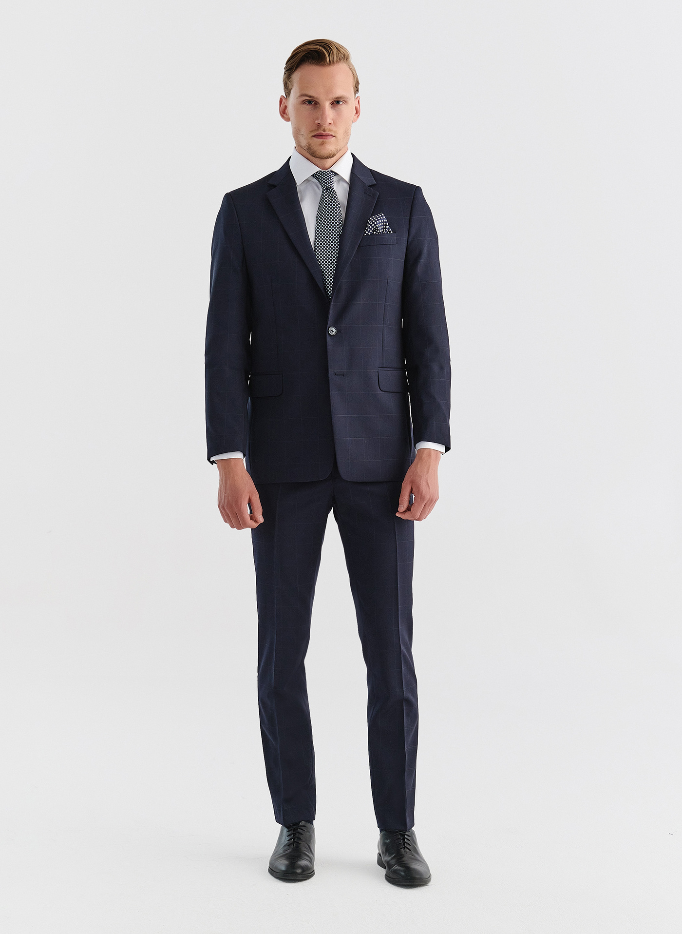 Wełniane spodnie garniturowe w kratę - Pako Lorente