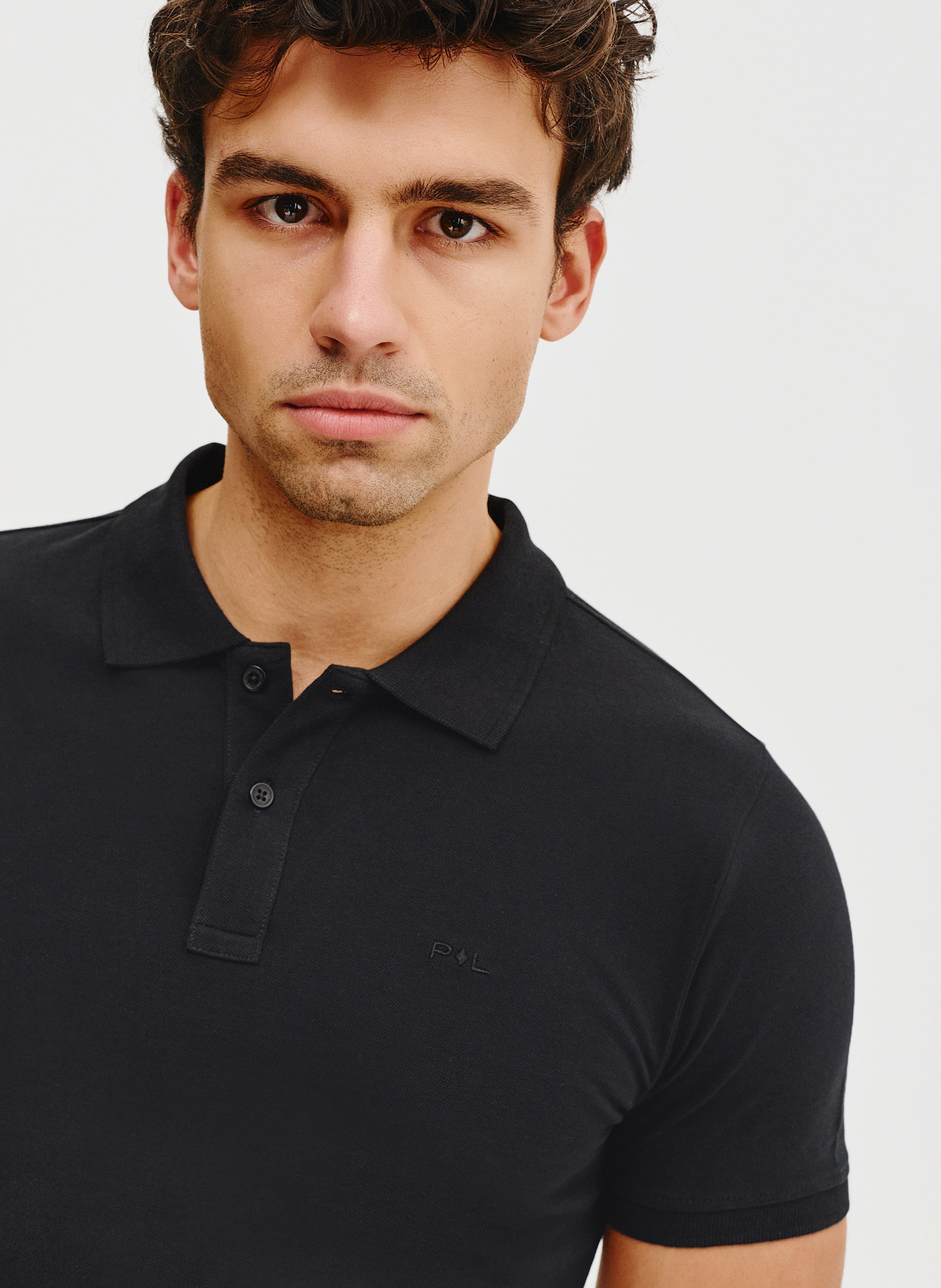 Gładki t-shirt polo w czarnym kolorze - Pako Lorente