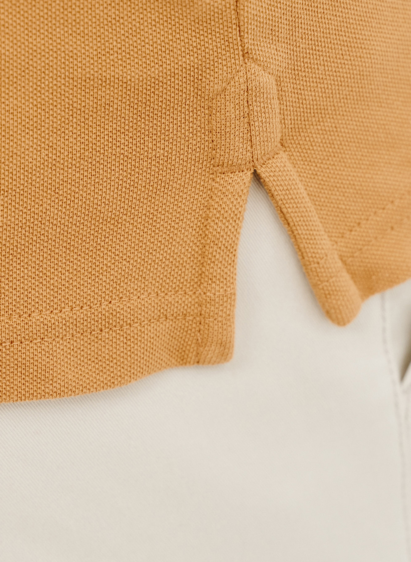 Gładki t-shirt polo w pomarańczowym kolorze - Pako Lorente