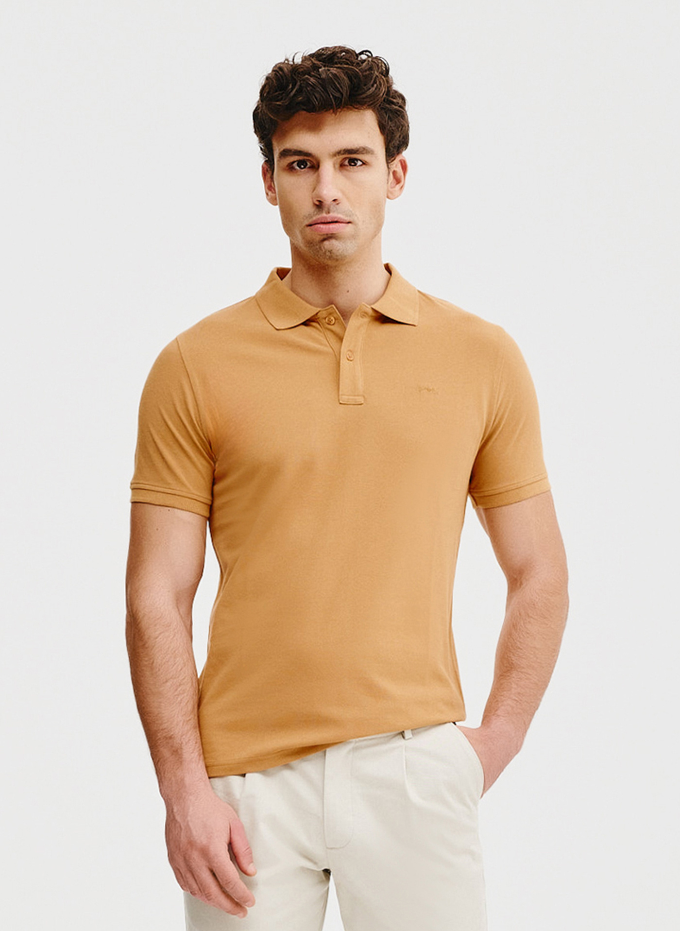 Gładki t-shirt polo w pomarańczowym kolorze - Pako Lorente