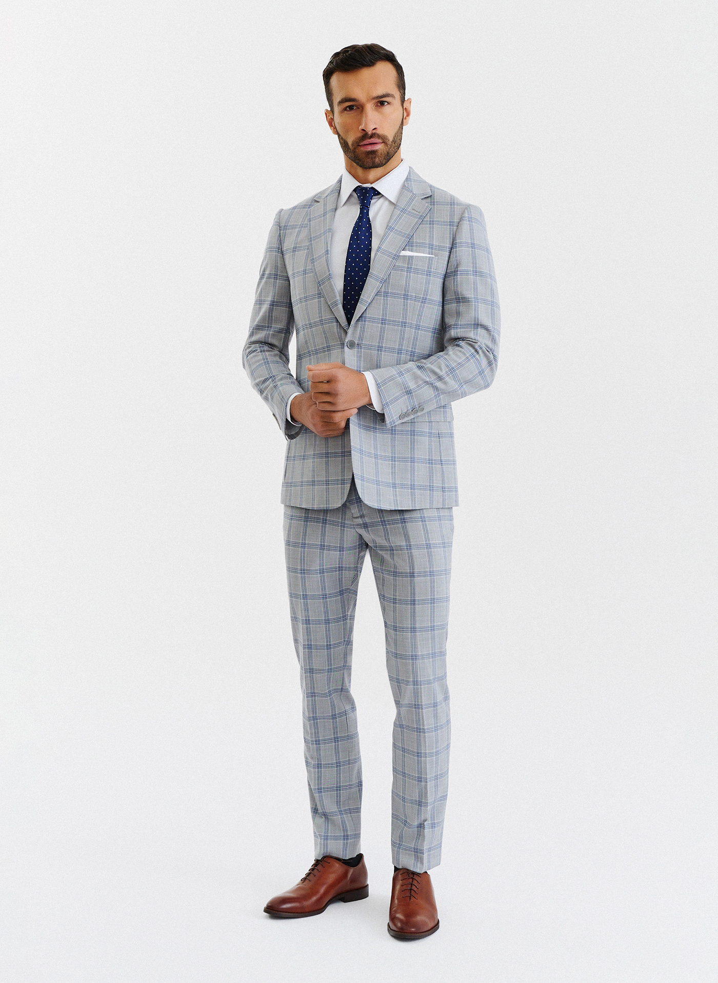 Szare spodnie garniturowe w niebiesko-białą kratę - Pako Lorente