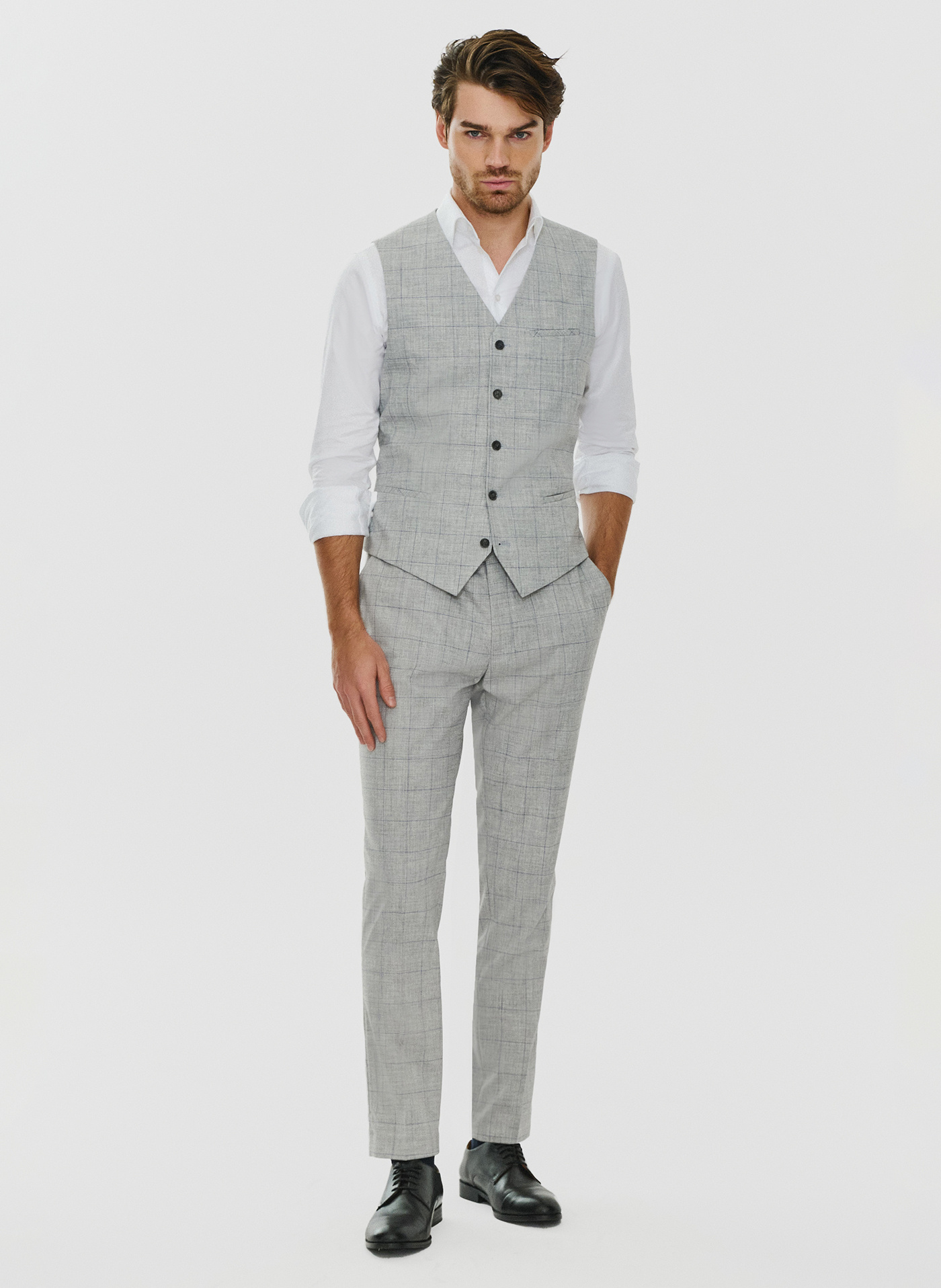 Szare garniturowe spodnie męskie w kratę - Pako Lorente