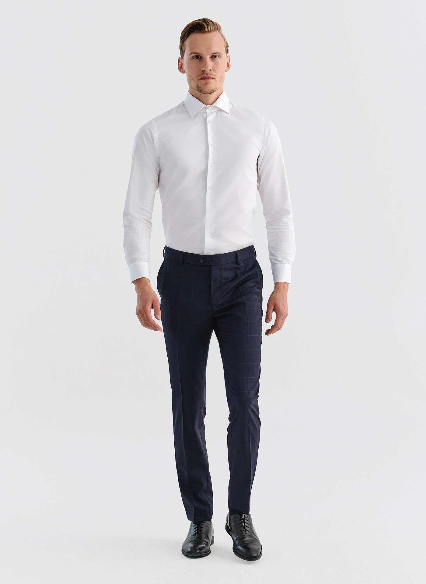 Wełniane spodnie garniturowe w kratę - Pako Lorente