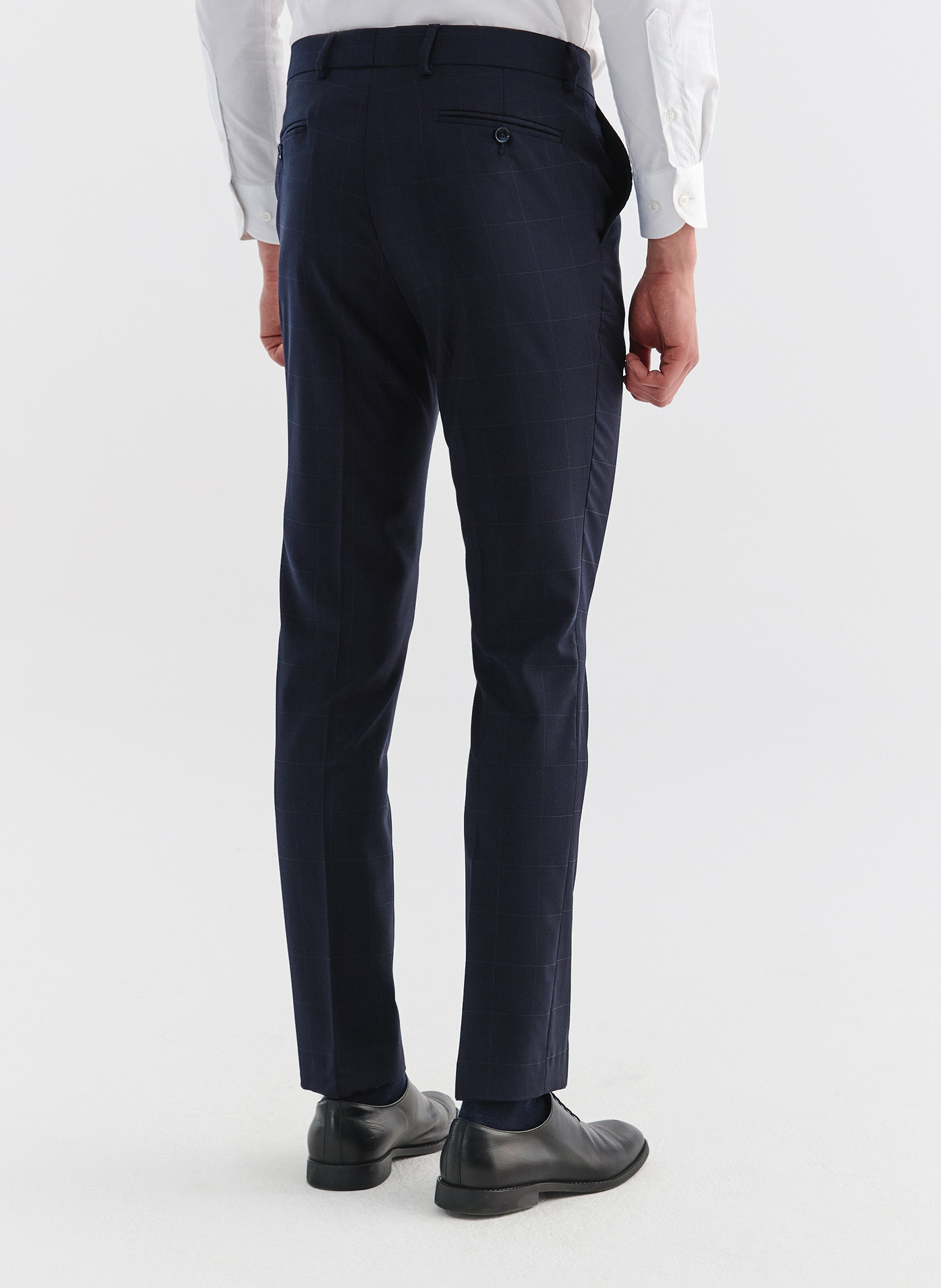 Wełniane spodnie garniturowe w kratę - Pako Lorente