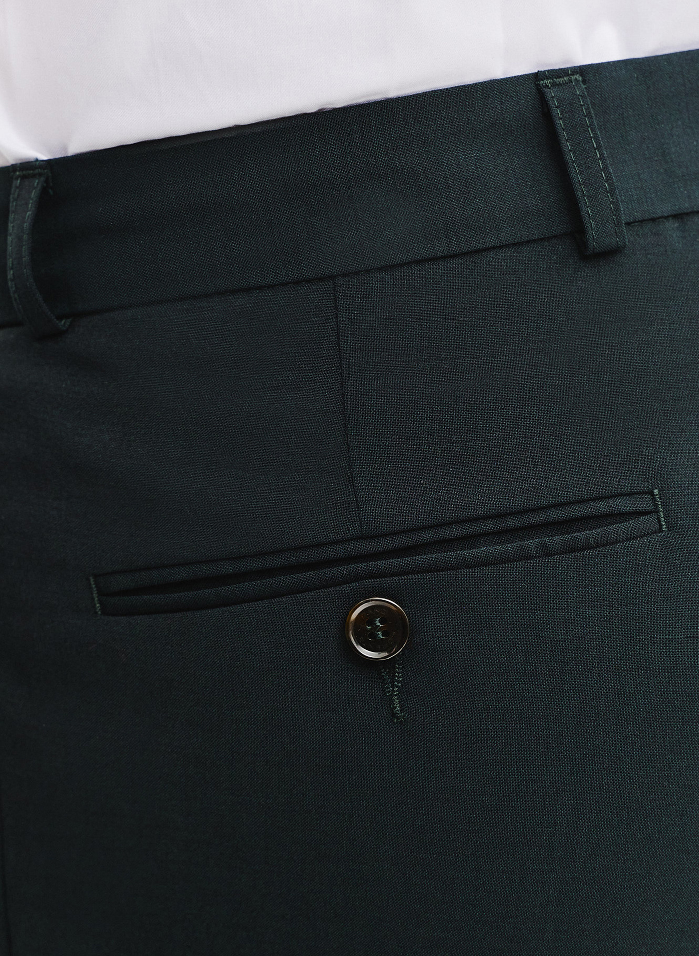 Wełniane spodnie garniturowe w kolorze zielonym - Pako Lorente