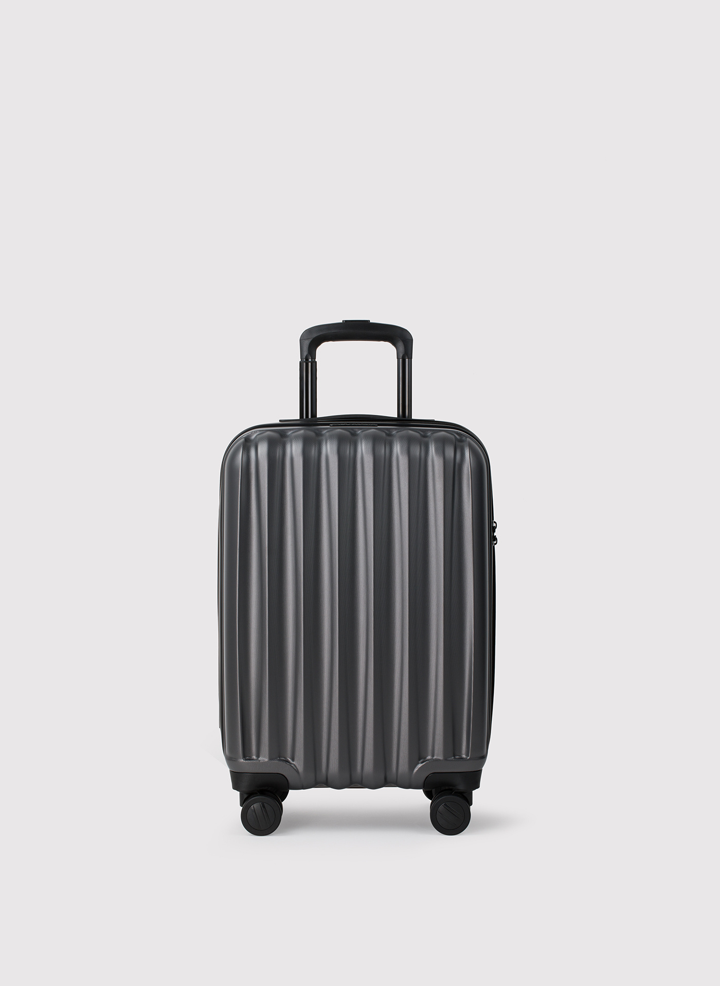 Mała ciemnoszara walizka ze żłobieniami - Pako Lorente